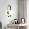 LumiCircle - Moderne Wandlamp met Glazen Bol en Cirkelvormig Design