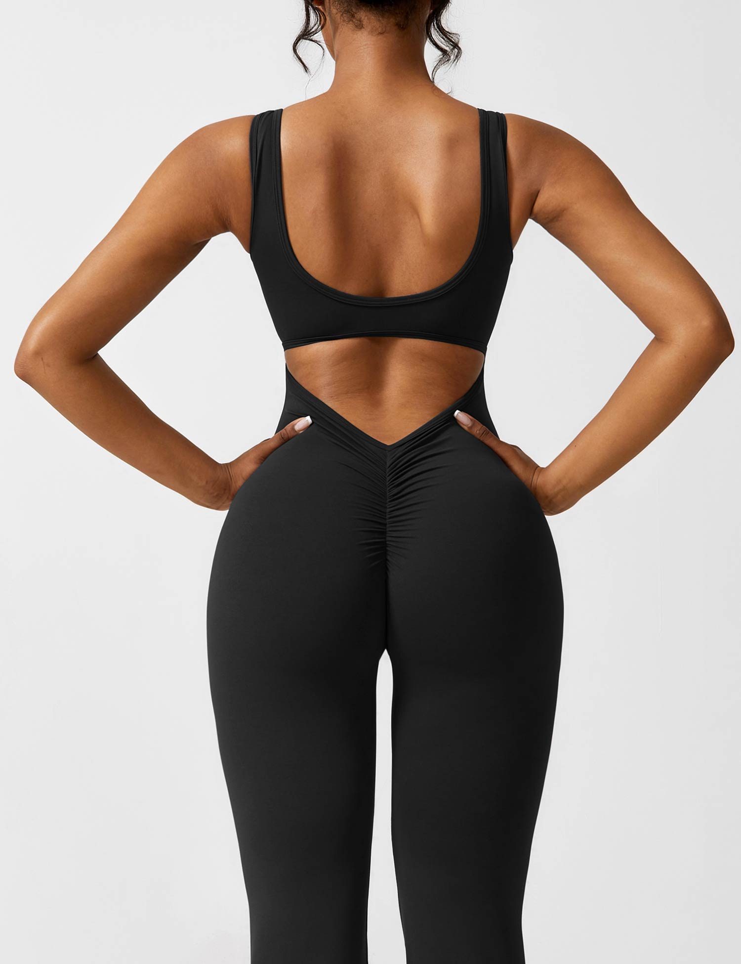 V-Hals Jumpsuit met Uitlopende Pijpen | Elegant en Flatterend Ontwerp