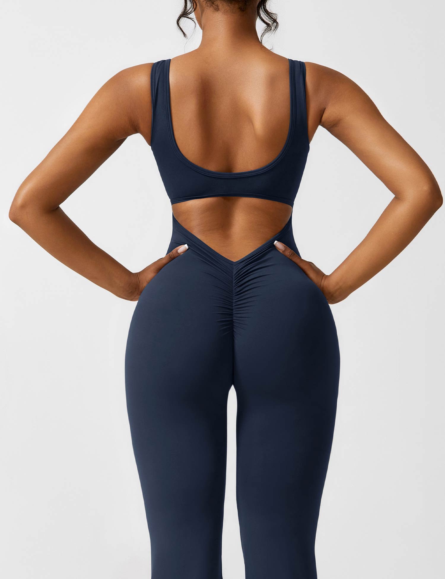 V-Hals Jumpsuit met Uitlopende Pijpen | Elegant en Flatterend Ontwerp